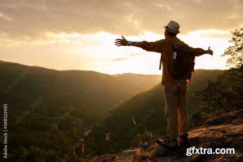 Traveler Standing On The Edge Of A Cliff And Look Around At The Mountain 6xJPEG