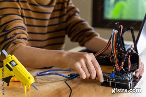 Young Man Code A Metal Car Robot And An Electronic Board 11xJPEG