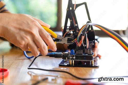 Young Man Code A Metal Car Robot And An Electronic Board 11xJPEG