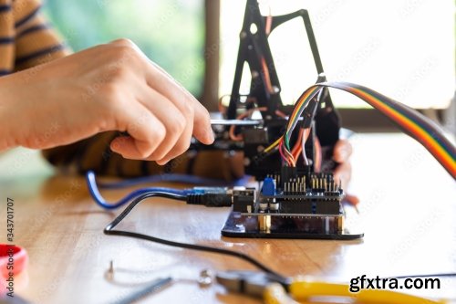 Young Man Code A Metal Car Robot And An Electronic Board 11xJPEG