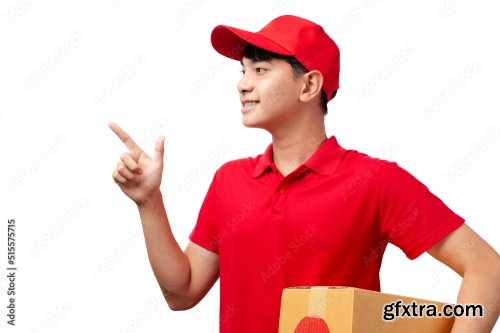 Portrait Of Young Handsome Asian Delivery Man Carrying Paper Parcel Standing On White Background 9xJPEG