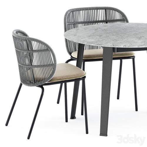 Kodo dining chairs by Vincent Sheppard and Ginepro round Outdoor table by bebitalia