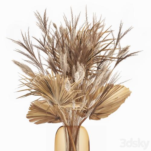 A beautiful bouquet of dried flowers in a glass vase with dry weinik branches and a dry palm leaf, branch . 150.