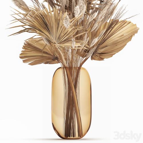 A beautiful bouquet of dried flowers in a glass vase with dry weinik branches and a dry palm leaf, branch . 150.