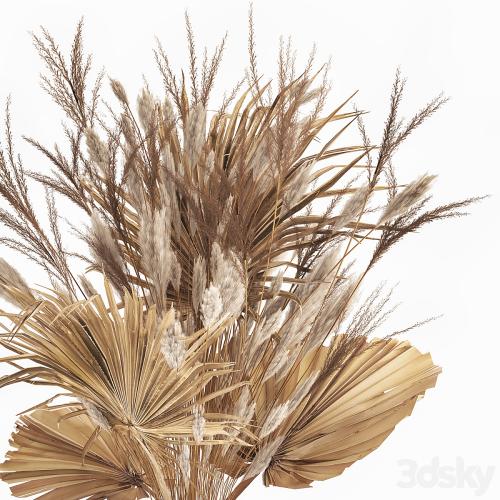 A beautiful bouquet of dried flowers in a glass vase with dry weinik branches and a dry palm leaf, branch . 150.