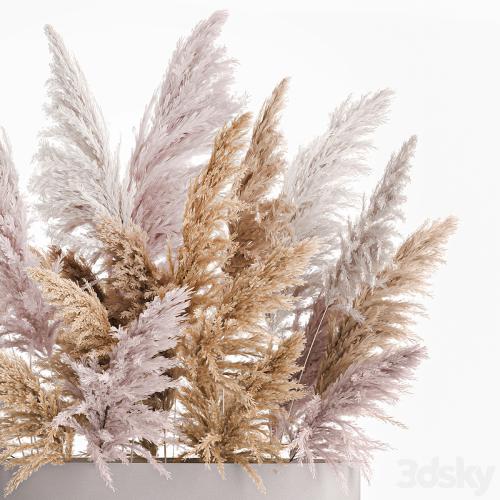 A lush bouquet of dried flowers with pink pampas grass, a vase of Cortaderia, branches. 190.