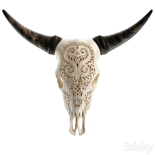 Carved cow skull