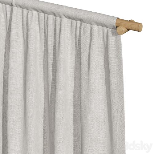 Linen curtains on a wooden cornice