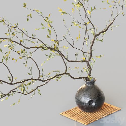 Plum branch in flower arrangement vase