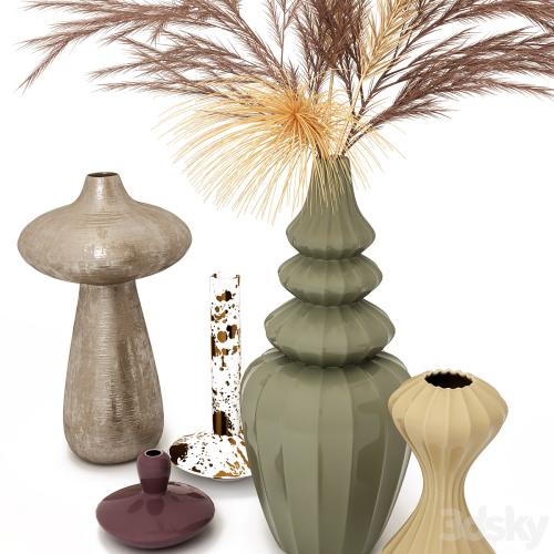 A set of vases with decor.