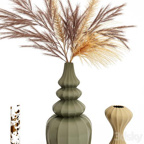 A set of vases with decor.