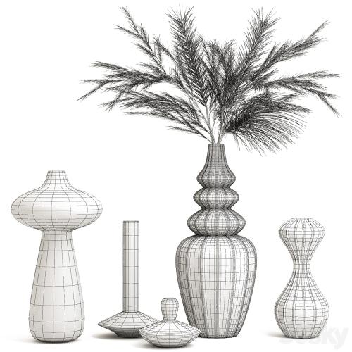 A set of vases with decor.