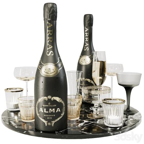 Collection of sparkling wine with crystal glasses and marble tray