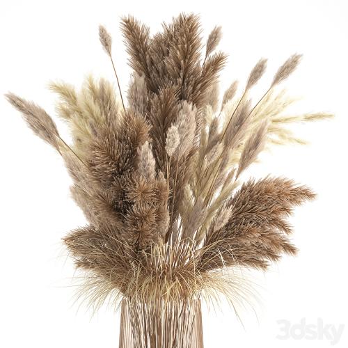 Beautiful lush bouquet of dried flowers in a vase with dry branches of pampas, Cortaderia, white reeds. 146.