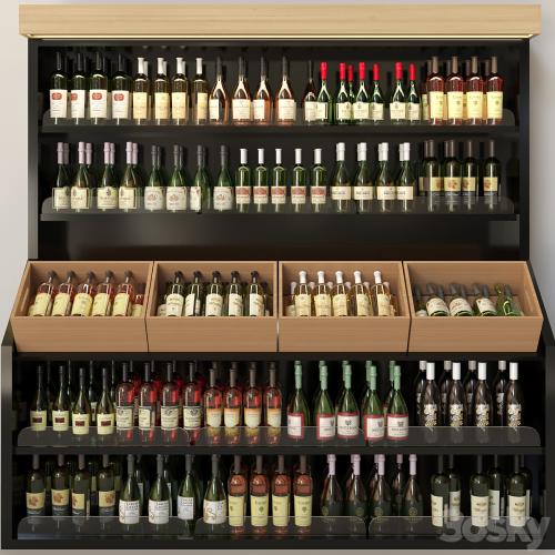 Wine cabinet with collectible wine in the supermarket. Wine and alcohol